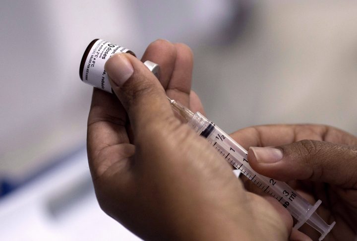 Measles, which is highly contagious and can be deadly, is spread through sneezing, coughing and breathing.